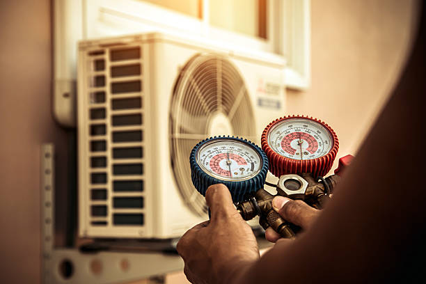 Professional Heat Pump Repair technician working in Redford, MI